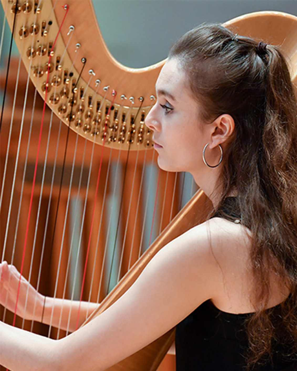 RCM harp student performing in AFCH